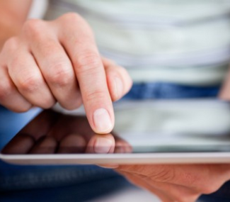 remote meeting hand on ipad